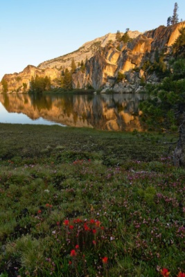 The warm, early-morning light illuminates the cliffs around Boothe Lake boothe lake sunrise reflection yosemite