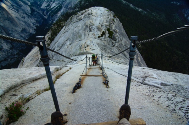I pause and take a few shots looking down the cables. yosemite backpacking half dome cables