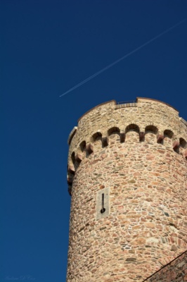 One of the turrets at Auerbach Schloß; the airplane overhead is quite the juxtaposition of modern and ancient airplane castle germany juxtaposition