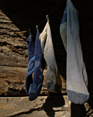Socks hanging from a line to dry after a long day of hiking on the wet Indiana Adventure Hiking Trail socks hiking backpacking indiana adventure hiking trail