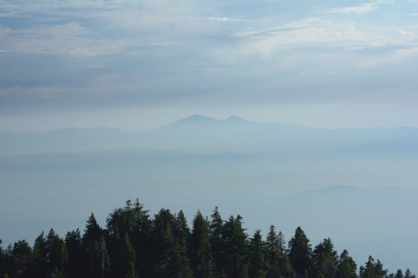 A lone mountain (San Jacinto) in the distance, through the mist/smog mount san jacinto sky mist