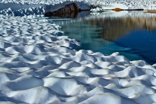 Snow cups and ice at high altitudes in the Sierra Nevada sierra nevada mountains wilderness snow ice