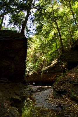 Rocky Hollow, Turkey Run State Park - what a neat place! Two hikers stand in the distance, providing a sense of scale. Rocky Hollow in Turkey Run State Park
