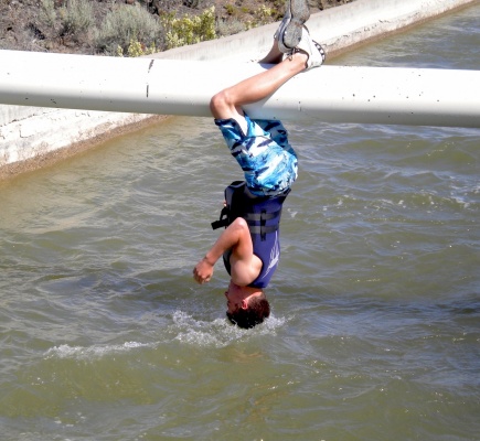 Jason dips his hair into the canal shoshone idaho canal swimming