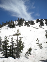 We reached the top of this ridge and then slid/trudged down to Edith Lake. If you look carefully, you can see our tracks sawtooth mountains wilderness glissade snow