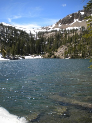 The pass we planned to ascend is clearly covered with snow and would be difficult to cross with the scanty winter gear we packed. sawtooth mountains wilderness edith lake snow