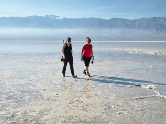 Iru and Jen demonstrate that the water is only a centimeter deep and it's quite possible to walk through it without getting your socks wet! death valley badwater basin