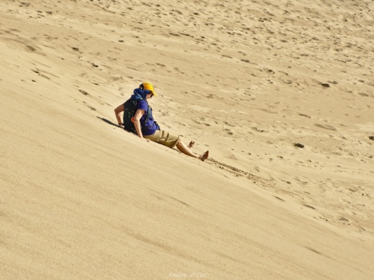 Aileen enjoys a slide down one of the dunes death valley mesquite sand dunes