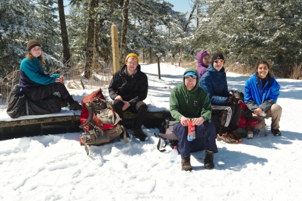 McKenzie, Greg, Ashley, Yi-Chun, Tibor, and Lulu perched on the snow to eat lunch smoky mountains backpacking