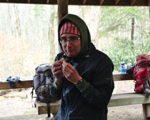 Ashley guards his food from other interested parties