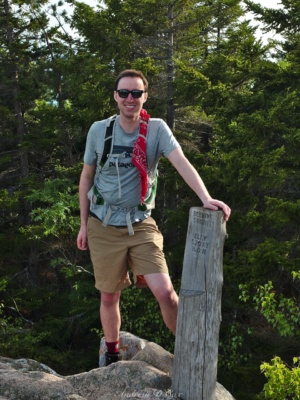 Nick with the Beehive summit sign acadia beehive summit