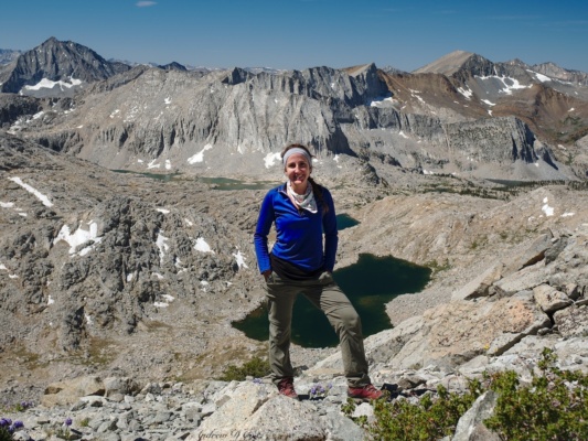 Amanda with the stunning views from Frozen Lake Pass sierra high route frozen lake pass