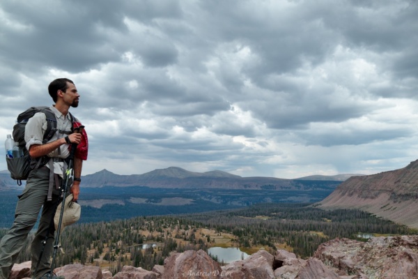Brian takes a photo of yours truly cheesily posing atop the pass uinta mountains rocky sea pass