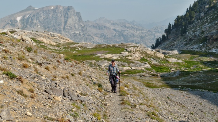 As we climb higher, the landscape grows more desolate teton mountains avalanche divide trail