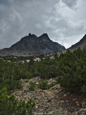 Dark clouds gather over Diamond Peak sierra high route baxter pass trail