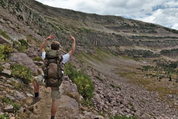 Brian poses on the trail that descends from Rocky Sea Pass uinta mountains backpacking