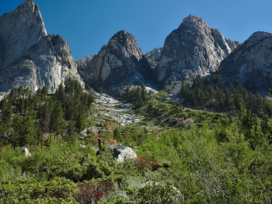 Massive granite domes loom over the sunny valley kings canyon castle domes