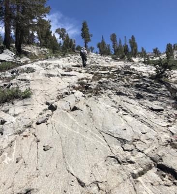 Large slabs of granite make for much easier hiking than the talus. Photo credit: Amanda sierra high route granite ramps