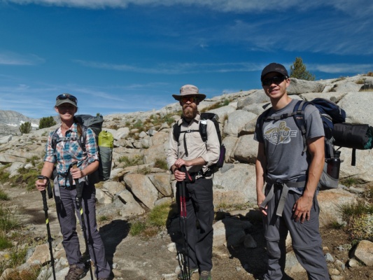 Diane, Daniel, and Josh pose on the trail in Humphreys Basin humphreys basin backpacking