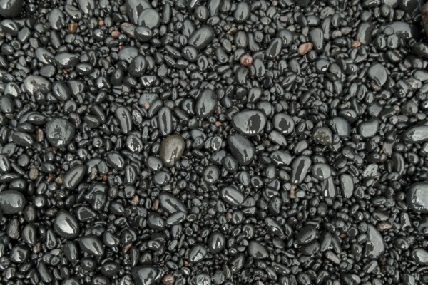 Some of the polished lava rock at Wai'anapanapa State Park wai'anapanapa state park black sand