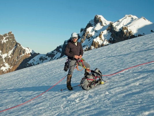 Mike poses in front of Colfax Peak on the Easton Glacier