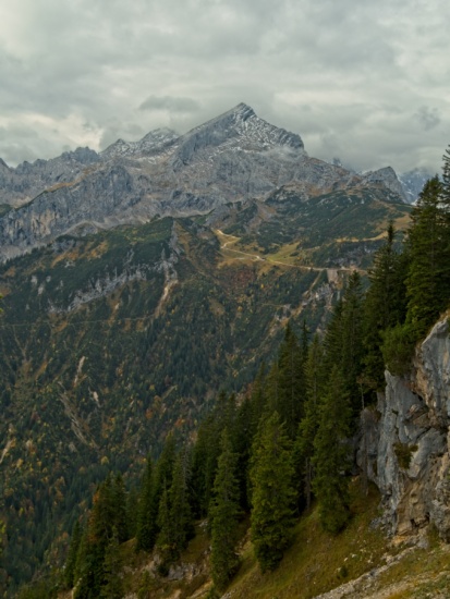 The formidable Alpspitze summit is shrouded in wisps of cloud this morning germany alps alpspitze