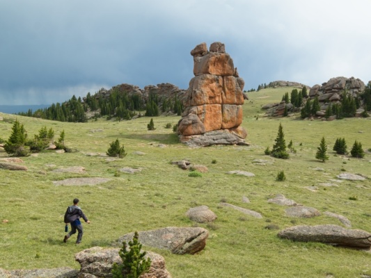 Josh and I hurry back to rejoin Diane and Daniel, passing through this incredible meadow with a huge rock formation lost creek wilderness