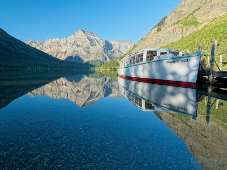 The Morning Eagle awaits the day's visitors to Lake Josephine glacier national park lake josephine