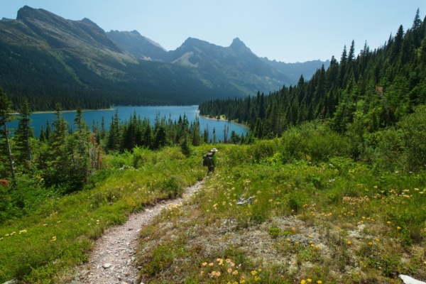 The trail to Helen Lake winds along Elizabeth Lake for a while glacier national park