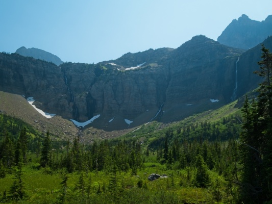 A number of incredibly tall waterfalls feed into this one valley glacier national park