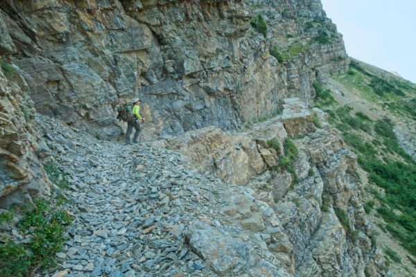 Steve hikes up the trail toward Gunsight Pass glacier national park gunsight pass trail