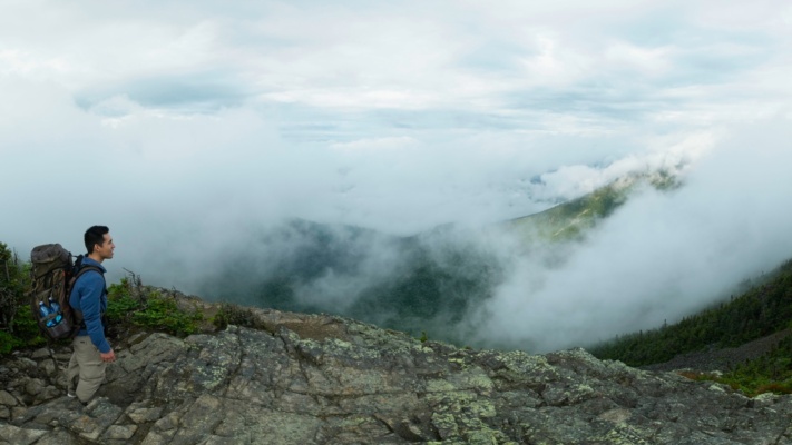 The clouds are moving quite quickly; every once in a while they clear enough to reveal some distant hills pemi loop