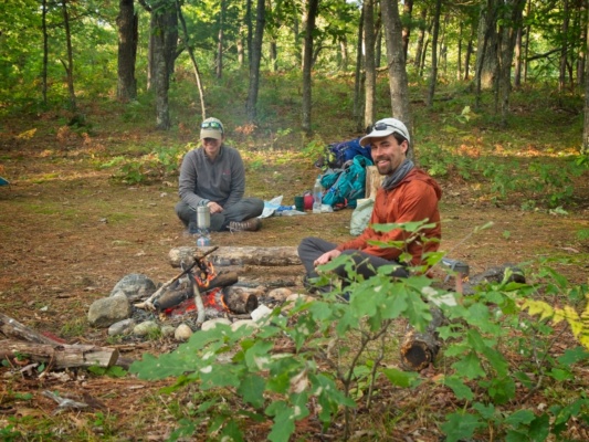 Emily and Andrew are cooking dinner; photo credit: Kenza camping