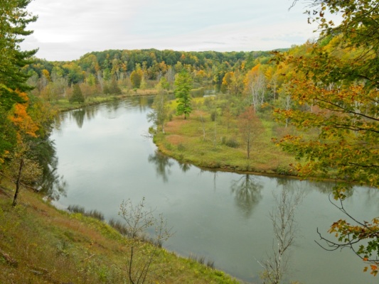 One of several sweeping views of the river and fall foliage along the trail manistee river trail