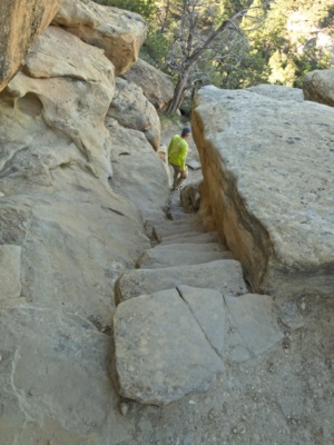 The petroglyph trail hugs the edge of the cliffs