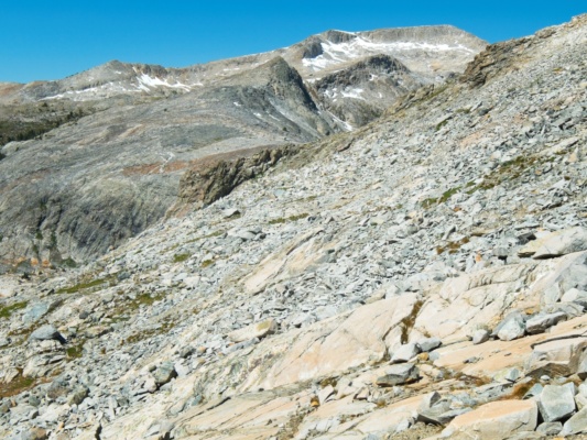 After traversing around the hillside for a few minutes, I catch a glimpse of the dark bluff that Roper mentions sierra high route dark bluff