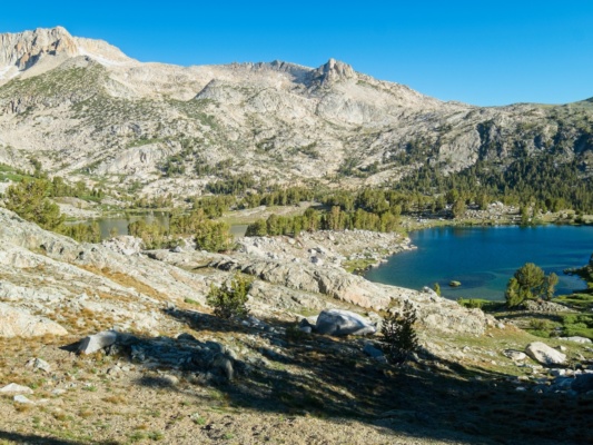 Green Treble Lake and Maul Lake lie before me with the long, eastern ridge of Mount Conness dominating the horizon sierra high route lakes