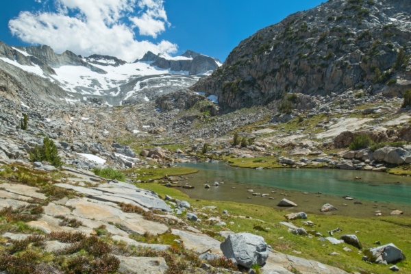 A massive snow field covers the upper slopes of Mount Lyell john muir trail donohue pass