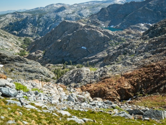 The vista from the hillside is impressive - one of the Twin Island Lakes is visible in the distance sierra high route twin island lakes