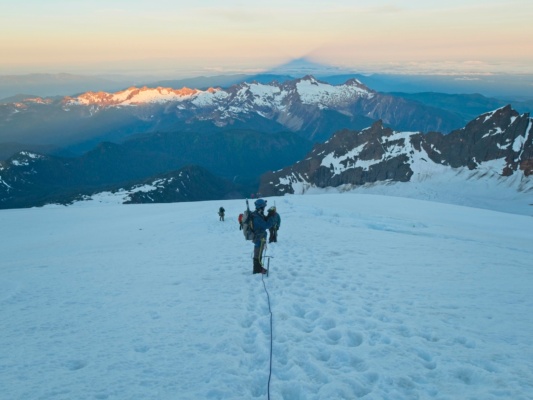 One of the coolest sights in mountaineering: the long shadow of the mountain at dawn mount baker easton glacier