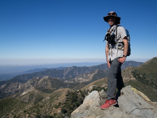 Daniel photographs me on top of the rocks