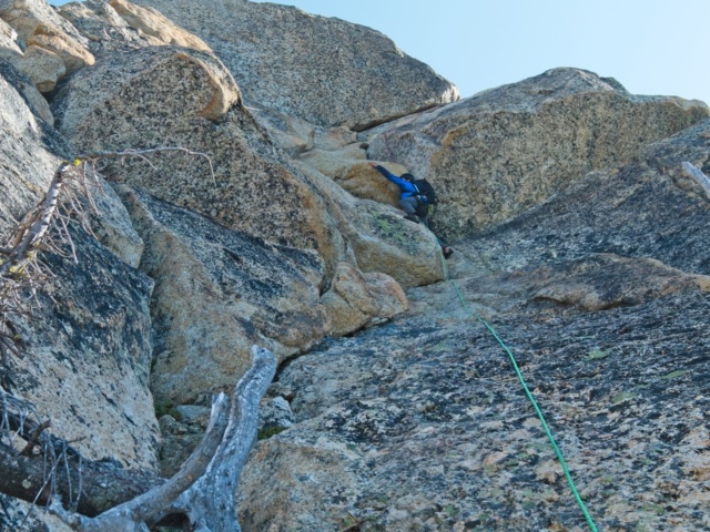 Matt Y. begins an exposed section of climbing beckey route liberty bell