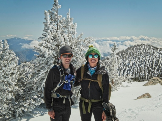 A friendly stranger snaps a photo of Kim and I at the summit san jacinto summit