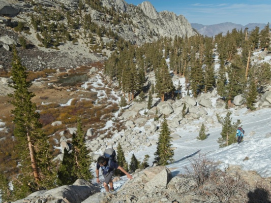 Josh and Kim make their way through the snow above Lower Boy Scout Lake mount whitney mountaineers route lower boyscout lake