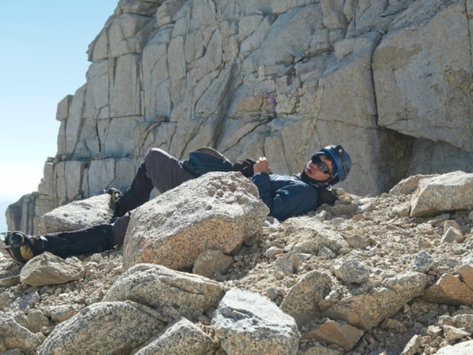 Josh relaxes at the notch before we begin the steep descent mount whitney mountaineers route nap