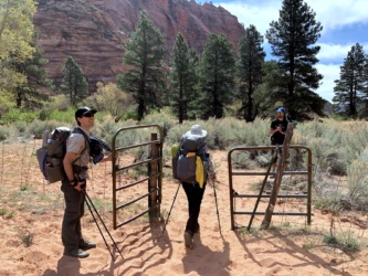 We pass through a gated fence in Hop Canyon; photo credit: Kim zion national park hop canyon