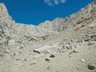The Rockwell Variation route follows this sandy valley up toward the cliffs mount russell rockwell variation