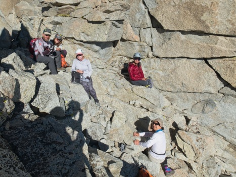 Bartek, Judy, Cherie, Sully, and John relaxing in the sun just below the ridge mount tyndall