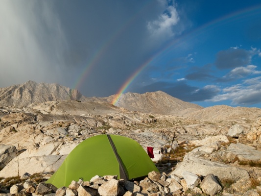 At its brightest, the rainbow becomes a double rainbow and supernumerary bands show on the brighter, lower 'bow rainbow