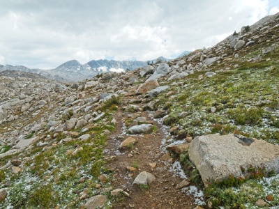 I hurry up the trail, both in an effort to stay warm and to set up my tent before the next round begins pacific crest trail